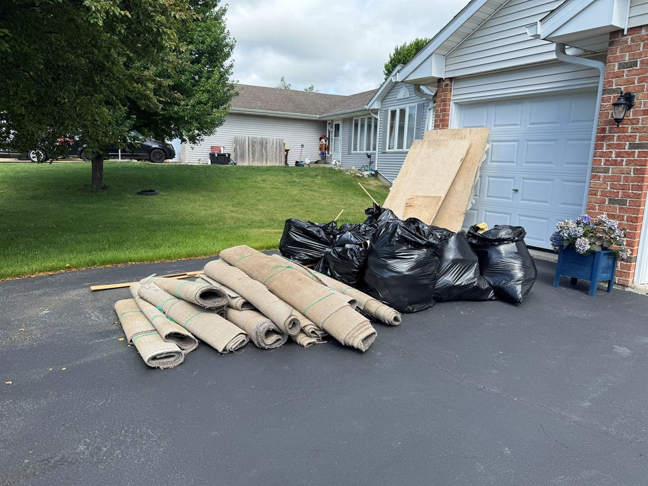 Junk removal in Rockford IL: carpet and driveway cleanout before
