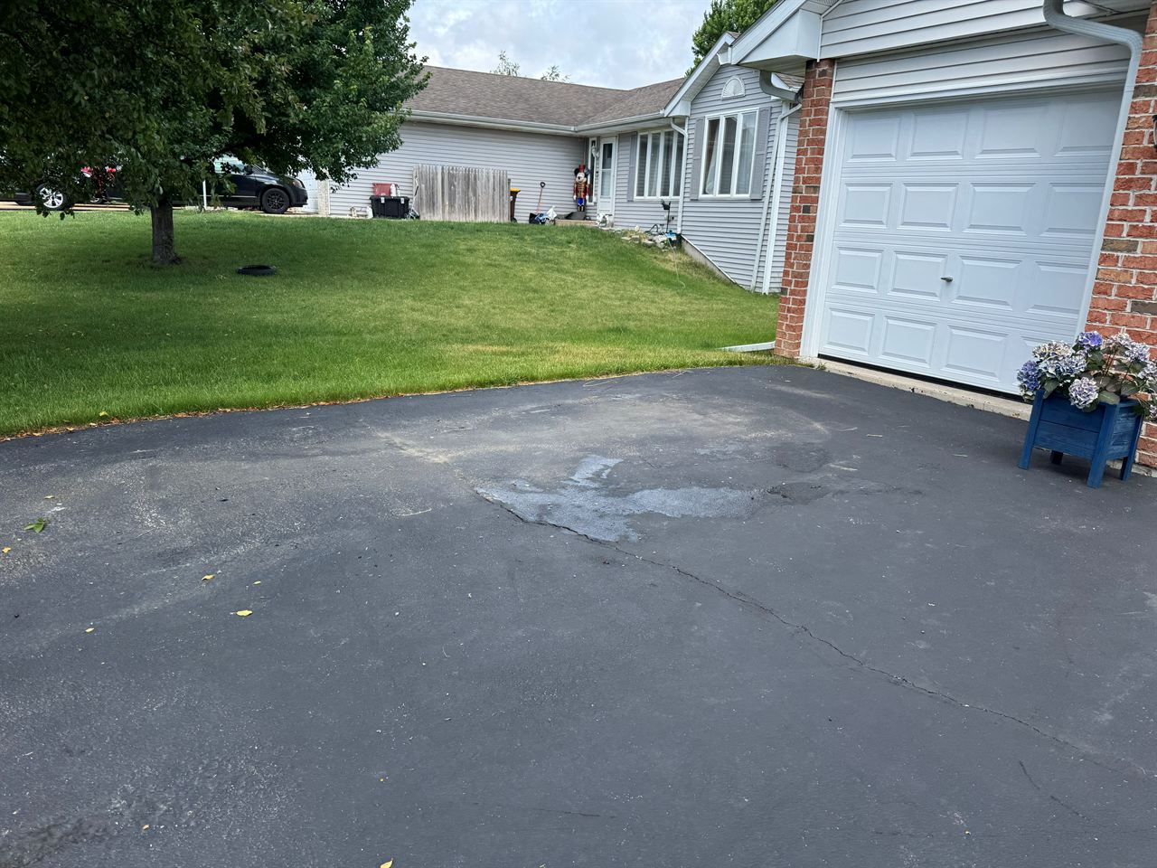 Junk removal in Rockford IL: carpet and driveway cleanout after